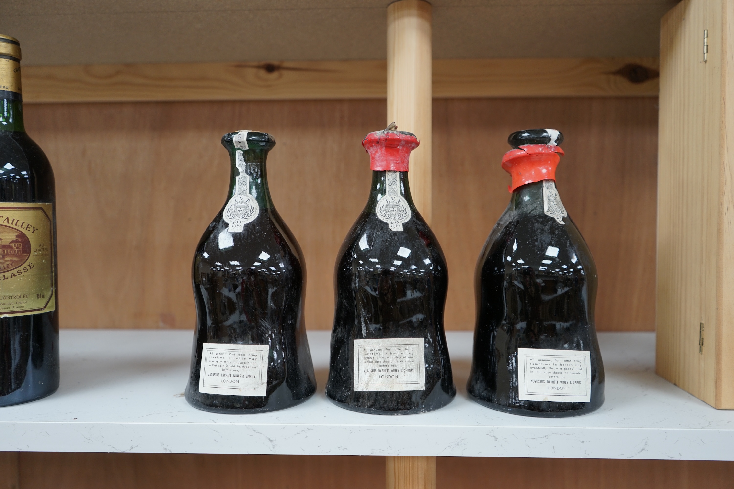 Three bottles of Porto Dalva house reserve port, comprising; 1934, 1940 and 1941. Condition - fair, some wear to labels and seals, etc.